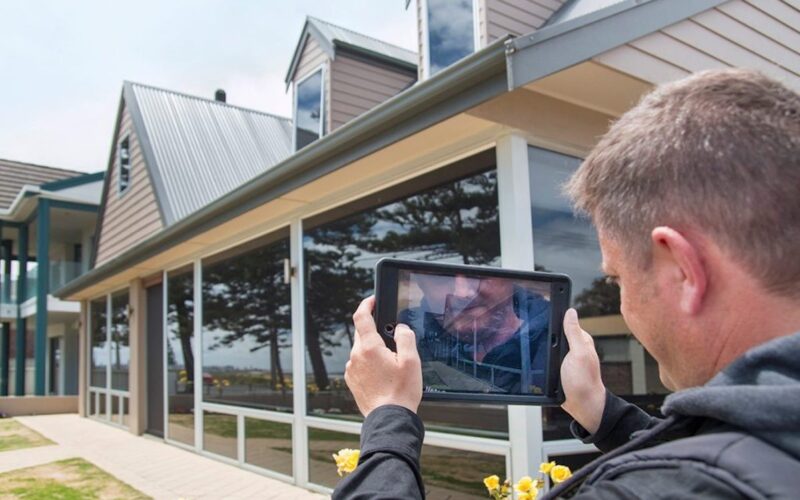 A man conducting a residential virtual inspection